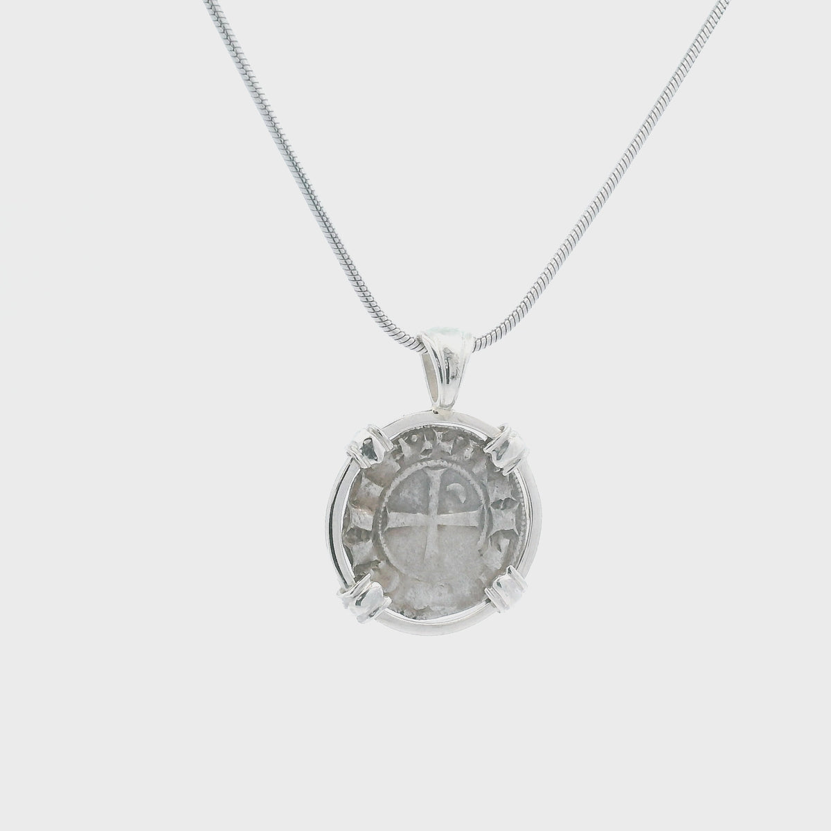 Rotating Silver Crusader-era coin pendant set in sterling silver.
