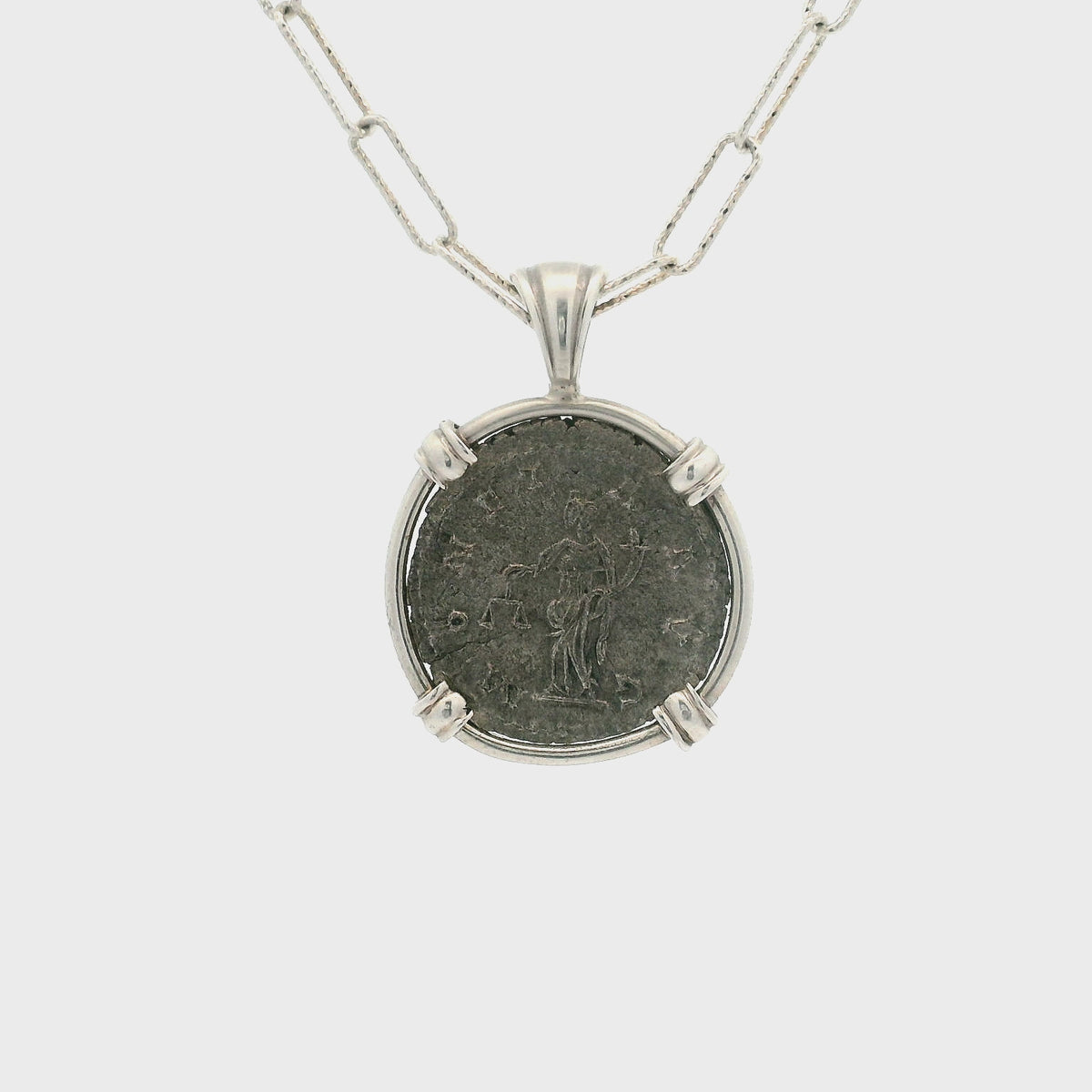 Rotating Silver Ancient Roman coin pendant set in sterling silver.