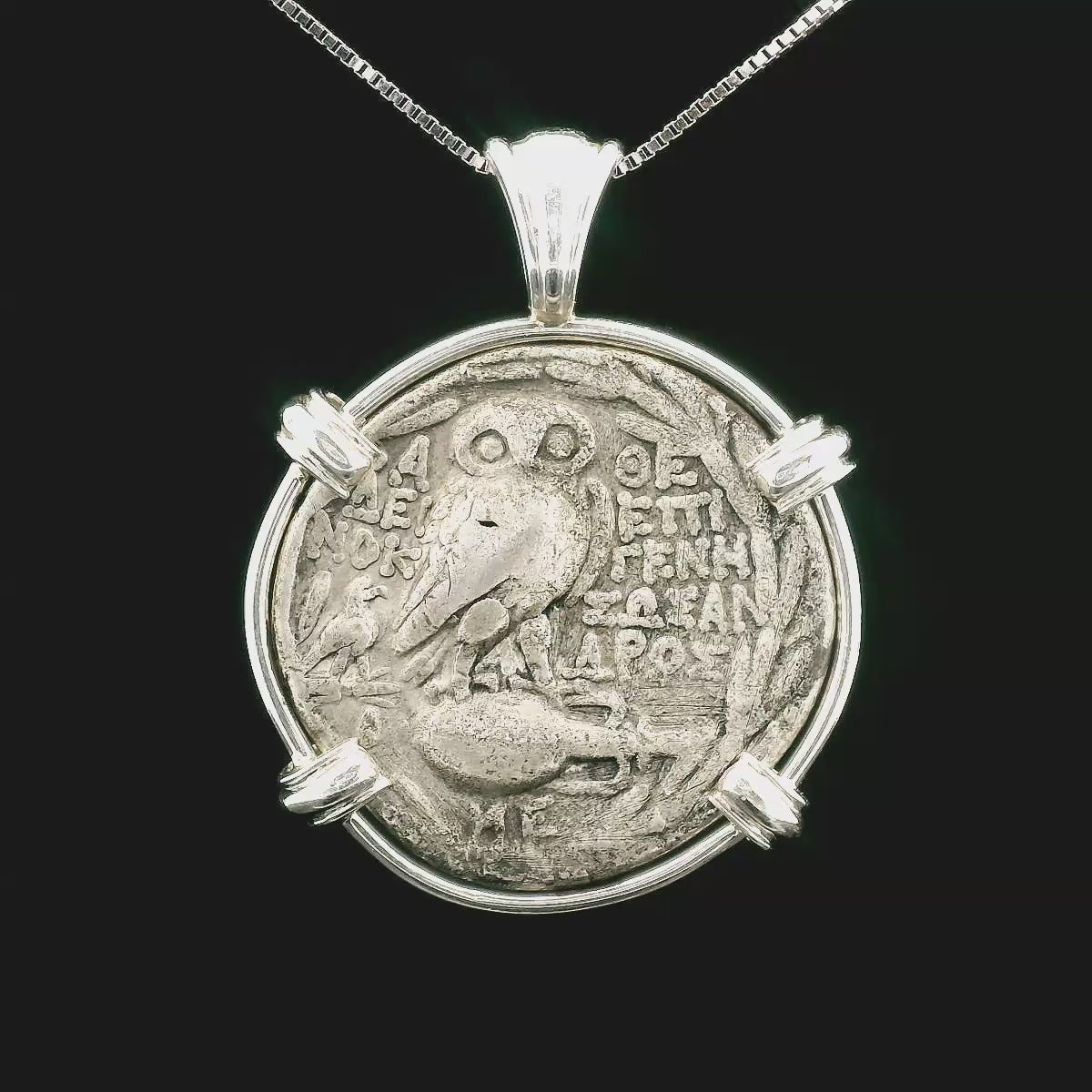 Rotating Silver Ancient Greek coin pendant set in sterling silver.