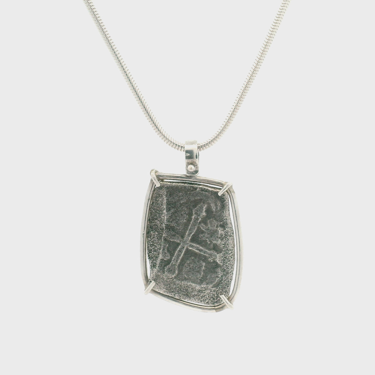Rotating Silver Piece of 8 coin pendant set in sterling silver.