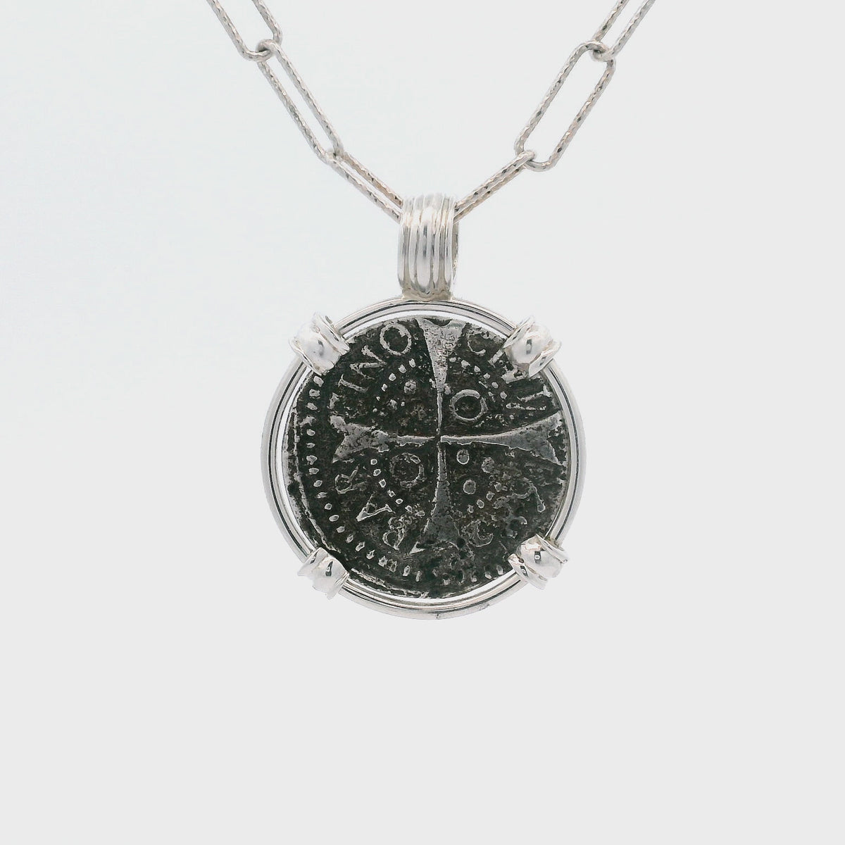Rotating Silver Croat coin pendant set in sterling silver.