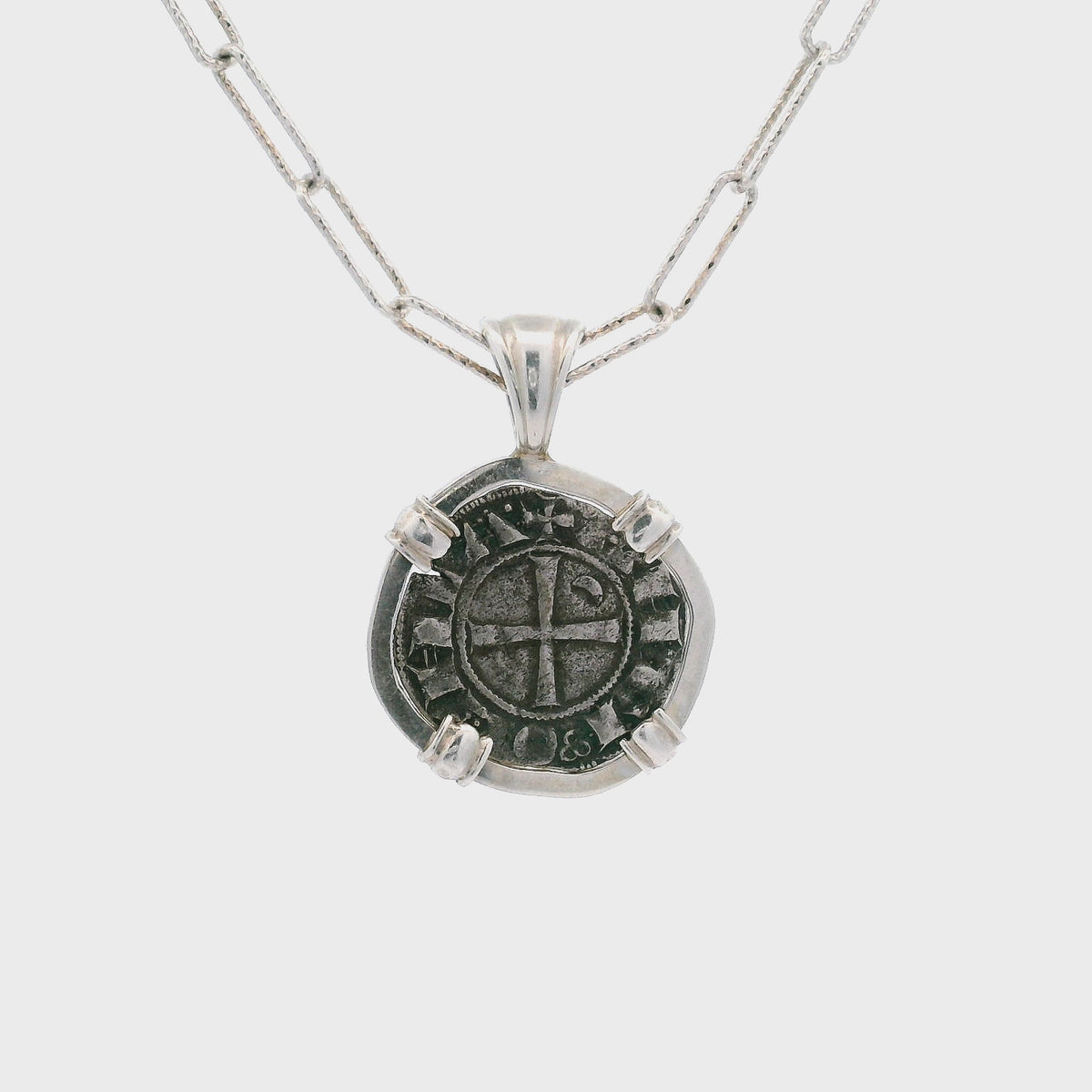 Rotating Silver Crusader-era coin pendant set in sterling silver.