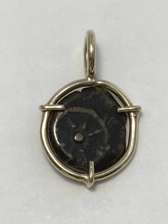 Sun wheel side of pendant