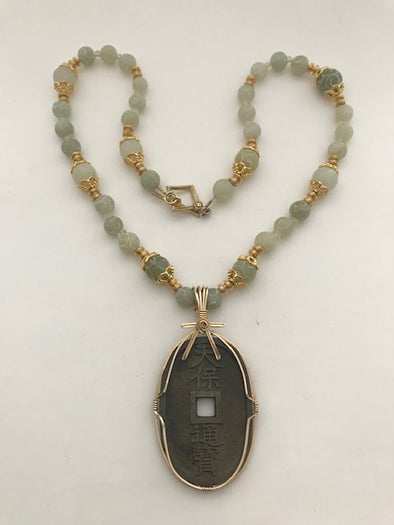 Image of beaded necklace with Japanese 1800s bronze con