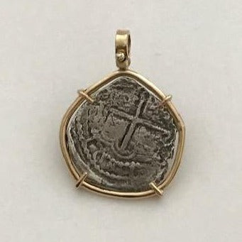 Atocha Treasure Silver Piece of 8 Recovered from the Florida Keys| Pendant is enhanced by a solid 14K gold setting